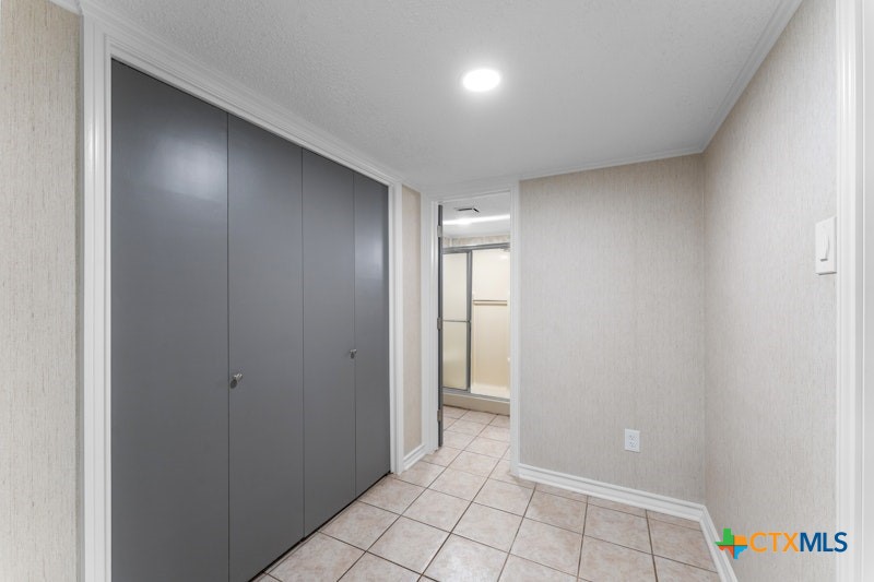 608 Ridgecrest Drive Salado, TX 76571 - Photo 34 of 43 storage in basement with view to basement full bath