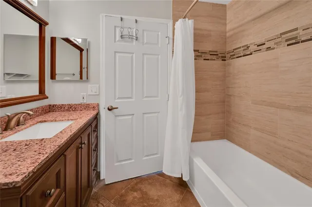 a view of room with wooden floor and window