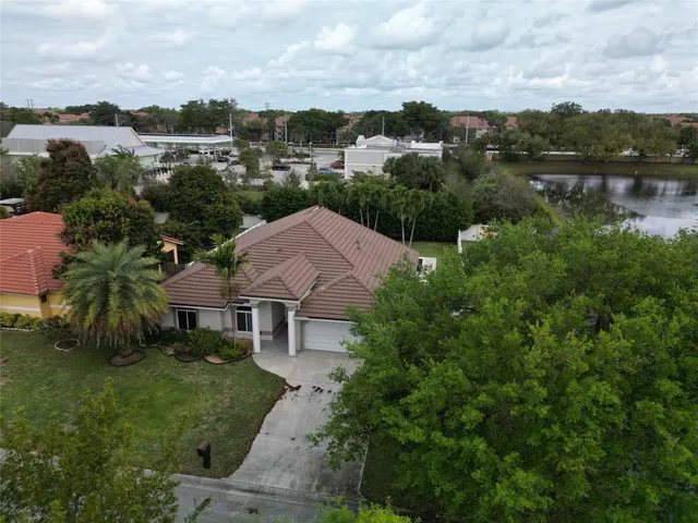 an aerial view of house with outdoor space