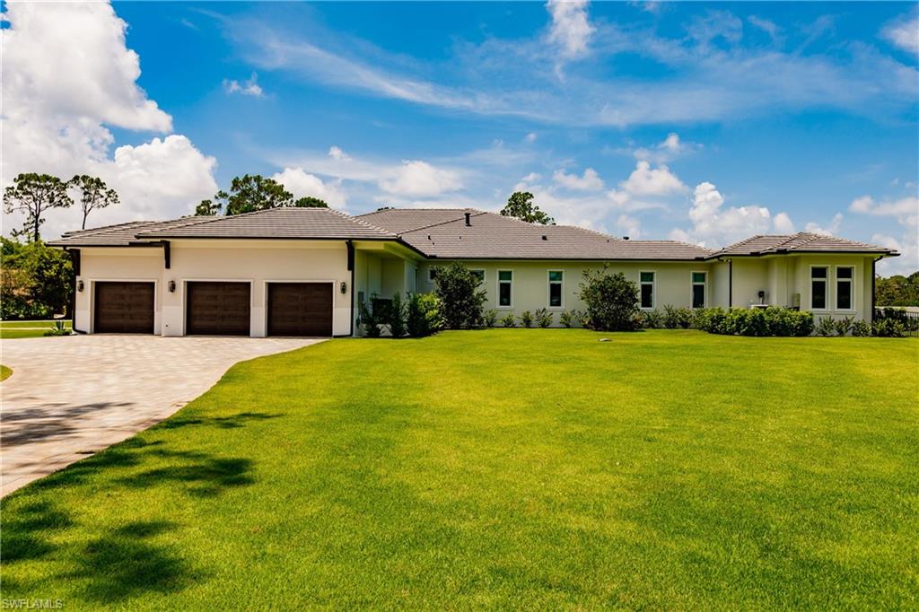 493 Myrtle Road Naples, FL 34108 - Photo 47 of 50 Side of Home with Garages