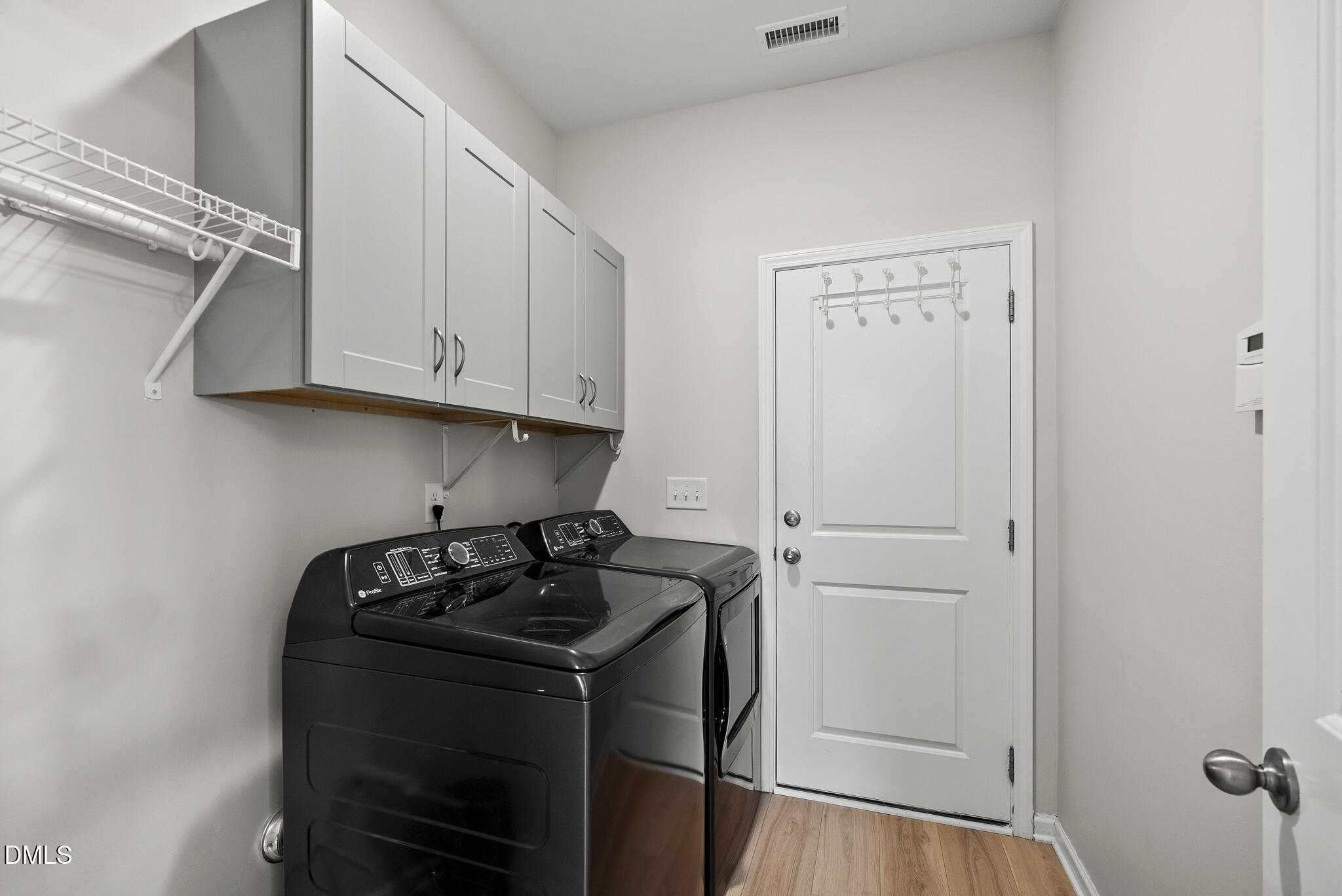 332 Forbes Road Wake Forest, NC 27587 - Photo 13 of 32 a kitchen with a sink and cabinets