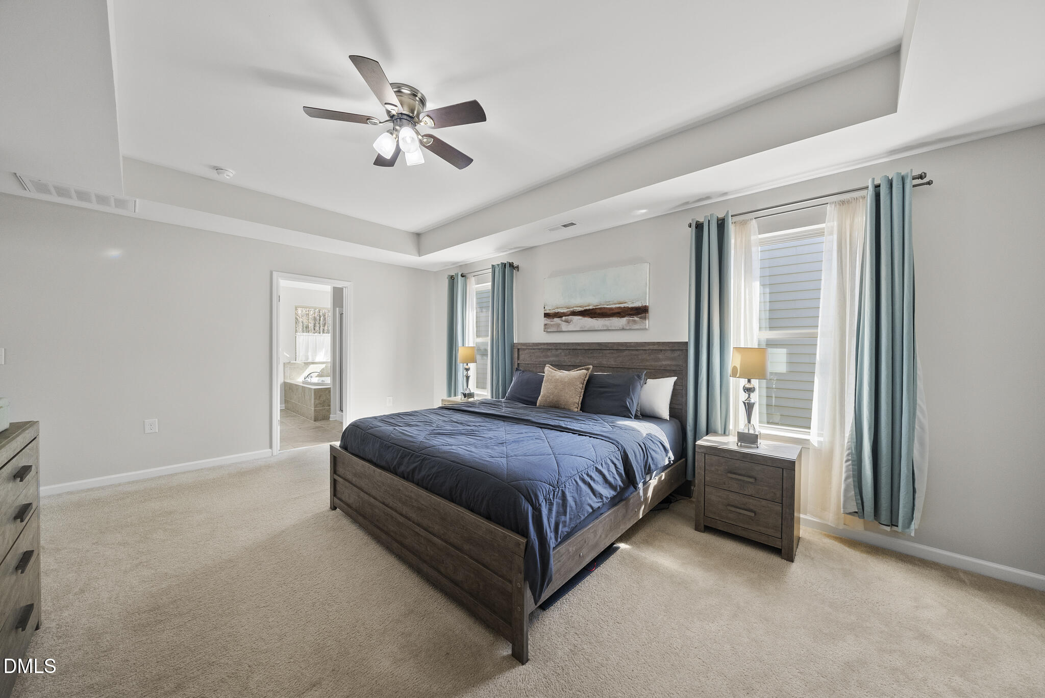 332 Forbes Road Wake Forest, NC 27587 - Photo 15 of 32 a spacious bedroom with a bed and window