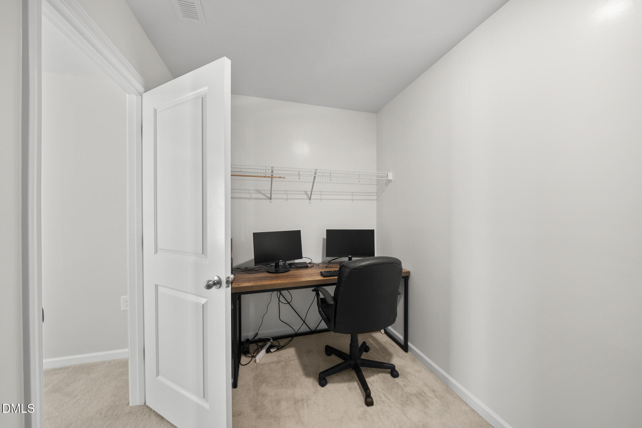 332 Forbes Road Wake Forest, NC 27587 - Photo 16 of 32 a view of a workspace with furniture and a window