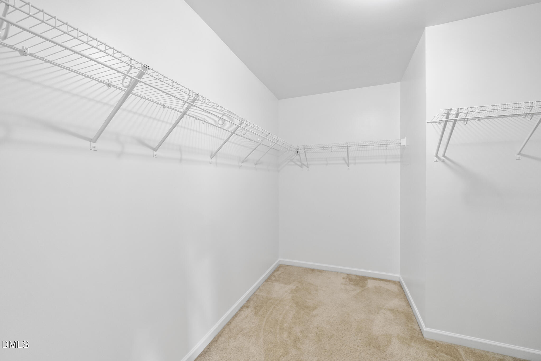 332 Forbes Road Wake Forest, NC 27587 - Photo 21 of 32 a view of a room with racks on the wall