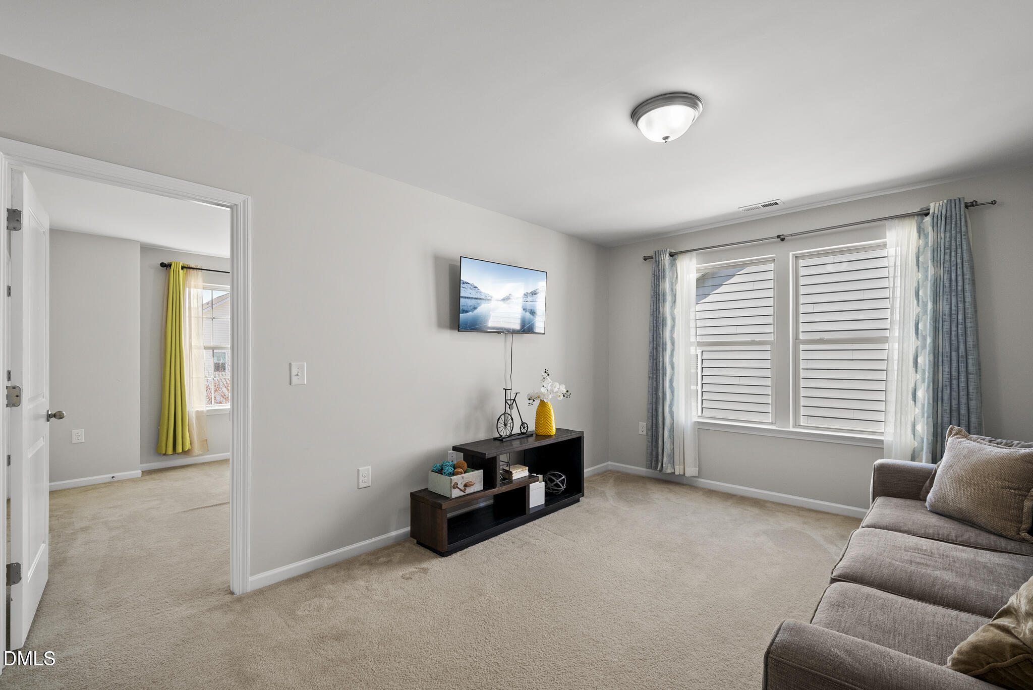 332 Forbes Road Wake Forest, NC 27587 - Photo 22 of 32 a living room with furniture and a window