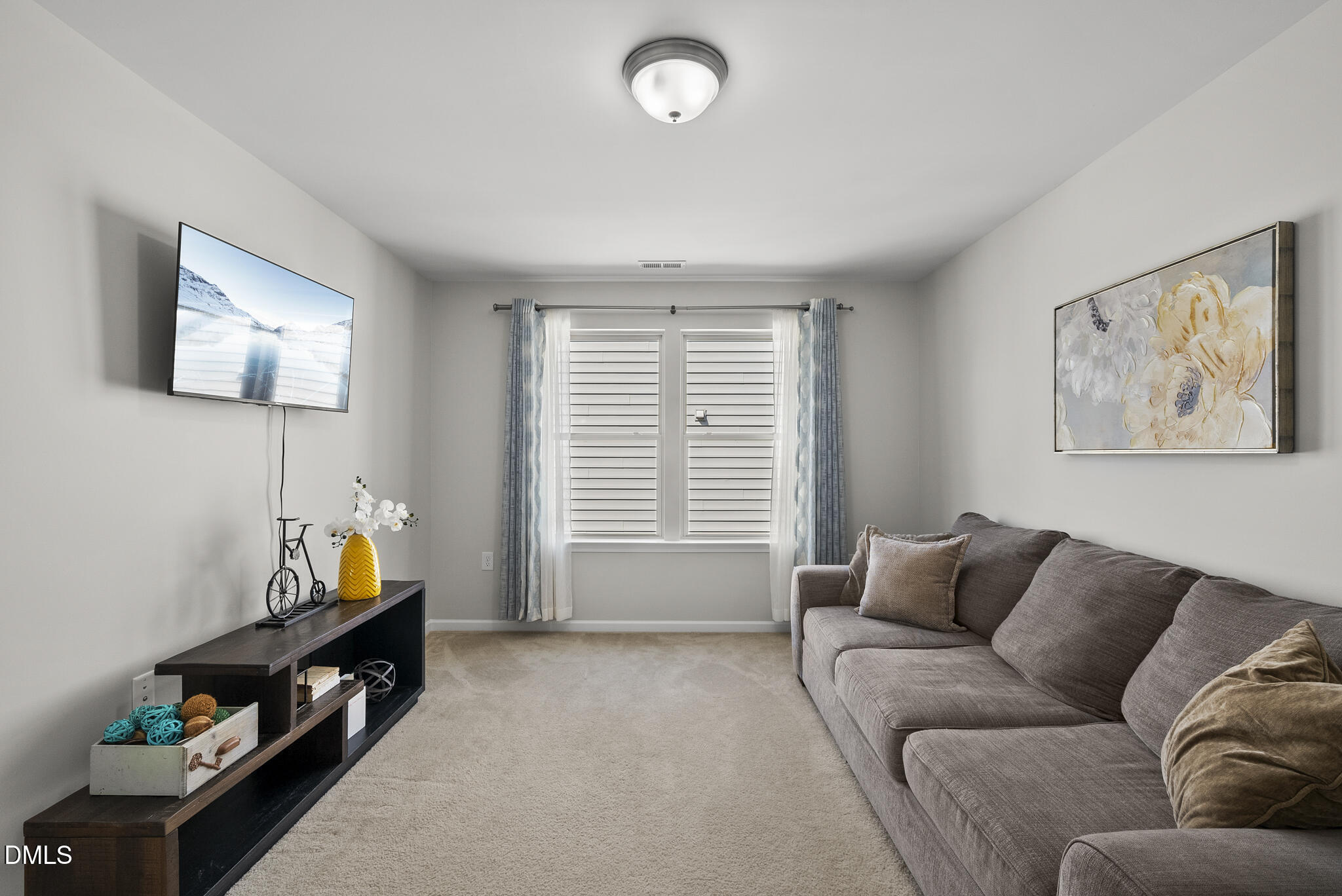 332 Forbes Road Wake Forest, NC 27587 - Photo 23 of 32 a living room with furniture and a window