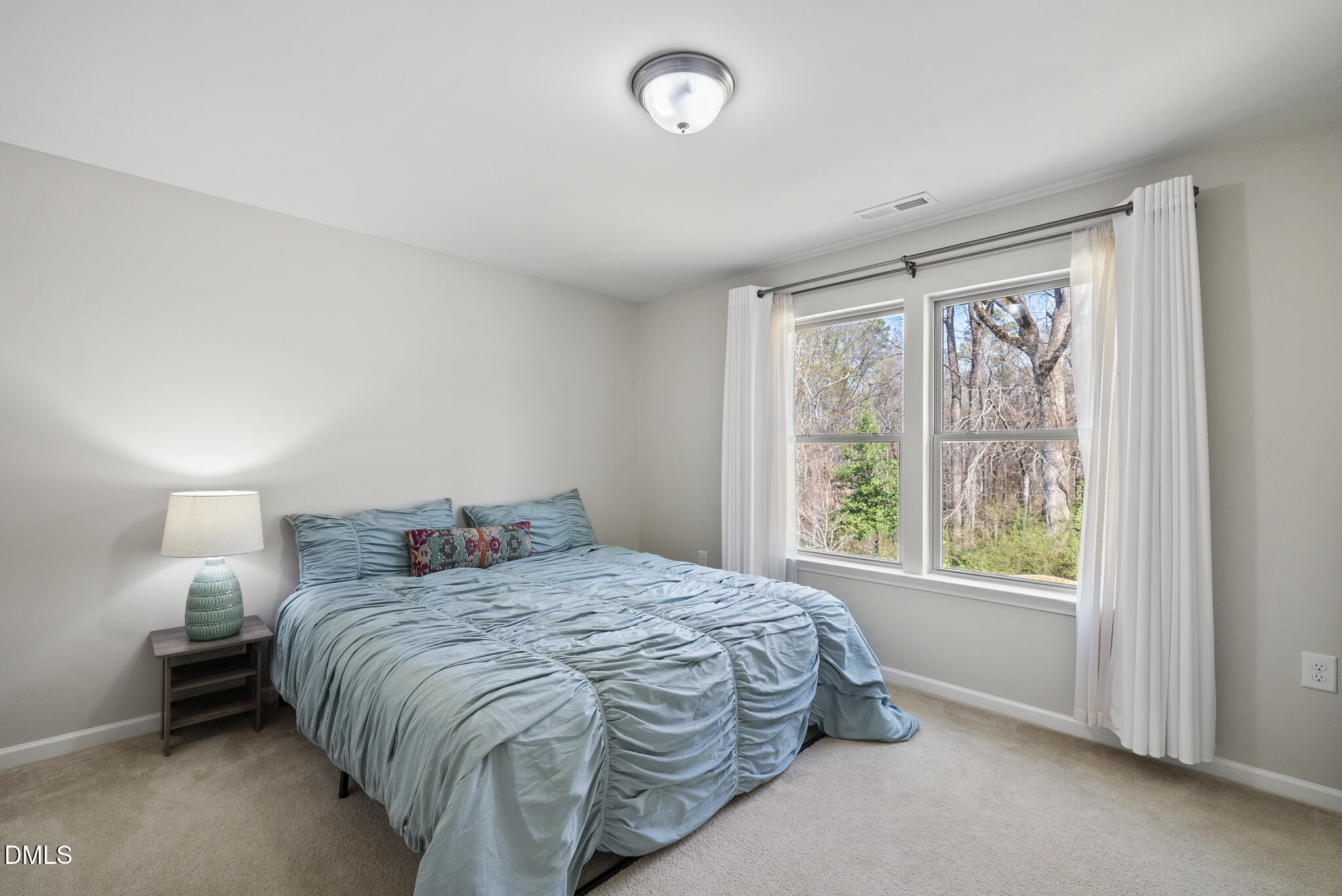 332 Forbes Road Wake Forest, NC 27587 - Photo 26 of 32 a bedroom with a bed and a window