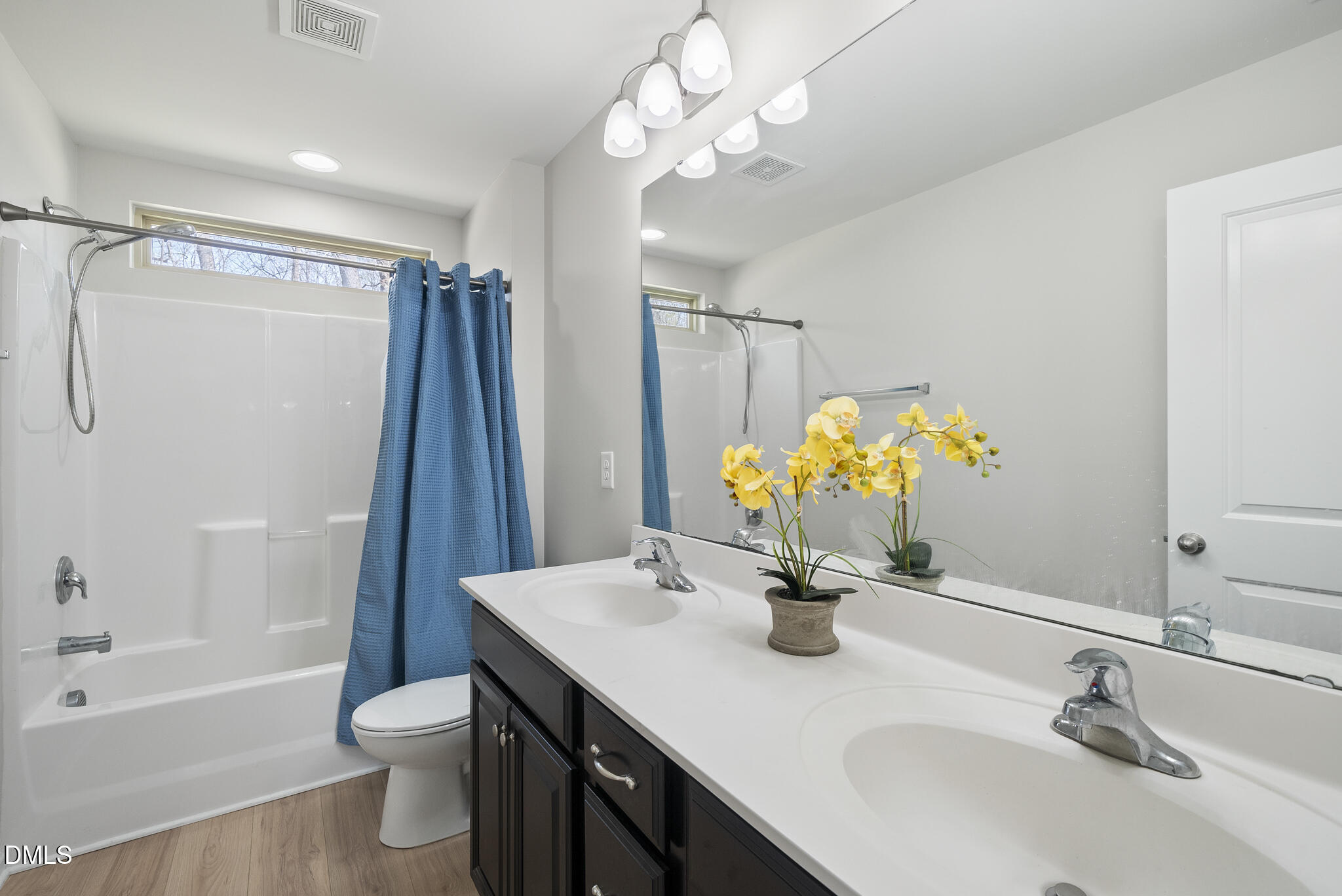 332 Forbes Road Wake Forest, NC 27587 - Photo 27 of 32 a bathroom with a sink a toilet and a bathtub