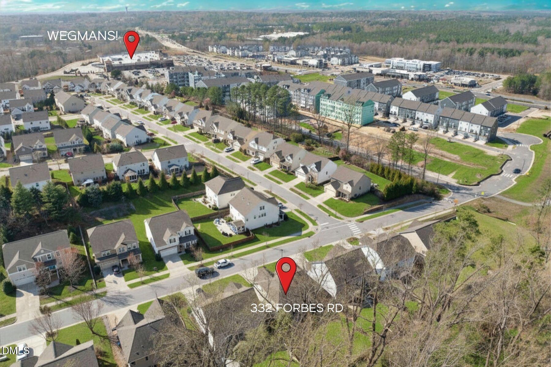 332 Forbes Road Wake Forest, NC 27587 - Photo 2 of 32 an aerial view of residential houses with outdoor space