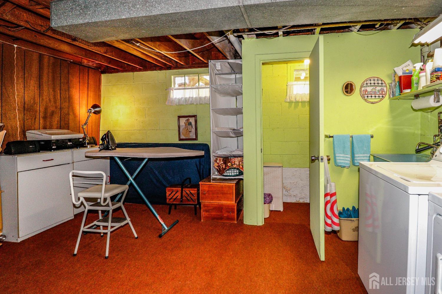 33 Harmon Road Edison, NJ 08837 - Photo 22 of 25 a room with musical instruments and furniture