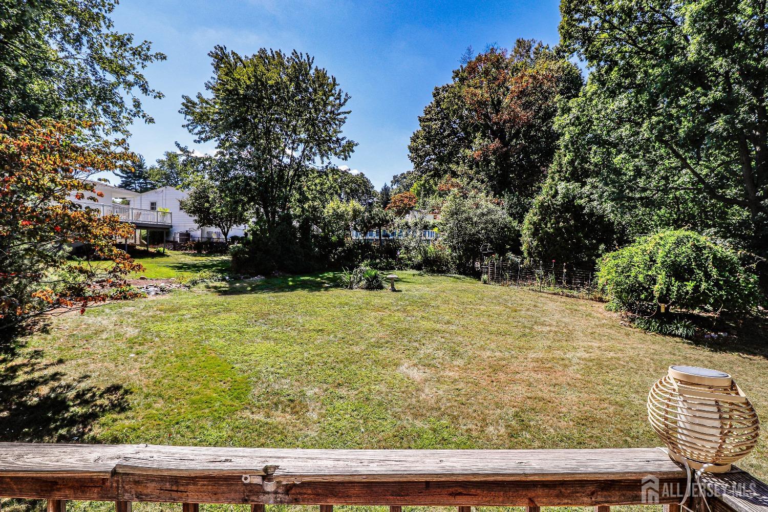 33 Harmon Road Edison, NJ 08837 - Photo 23 of 25 a view of swimming pool from yard