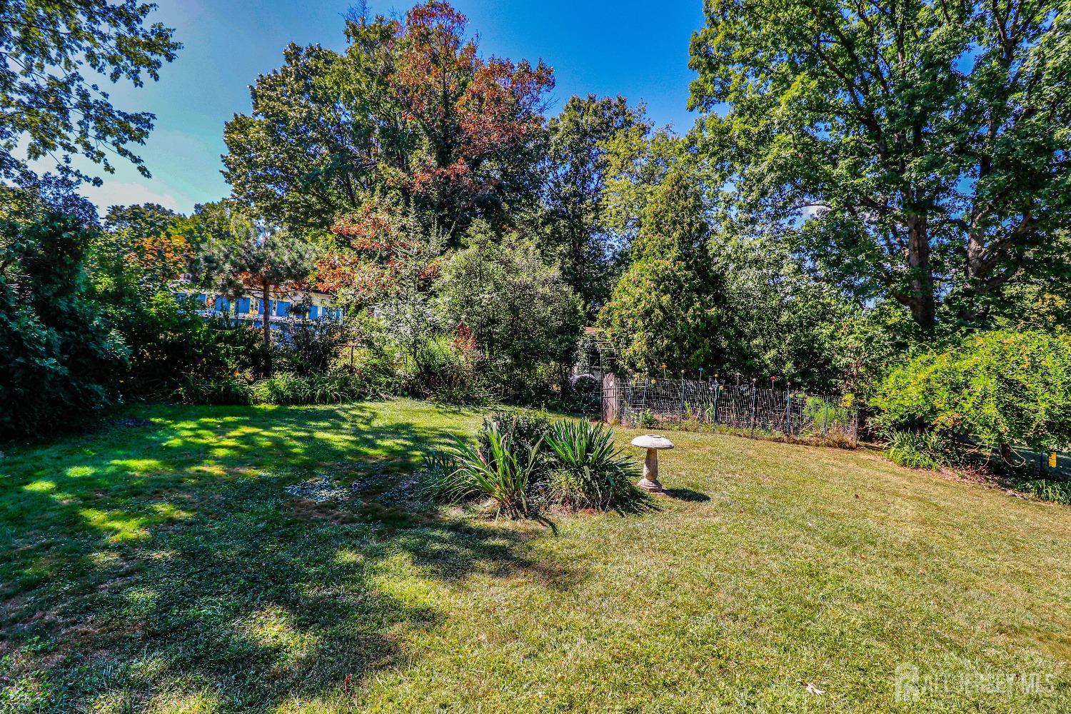 33 Harmon Road Edison, NJ 08837 - Photo 24 of 25 a backyard of a house with lots of green space