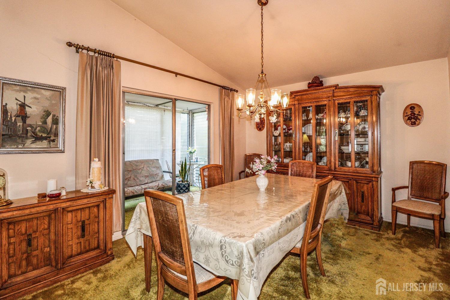 33 Harmon Road Edison, NJ 08837 - Photo 7 of 25 a view of a dining room with furniture window and outside view