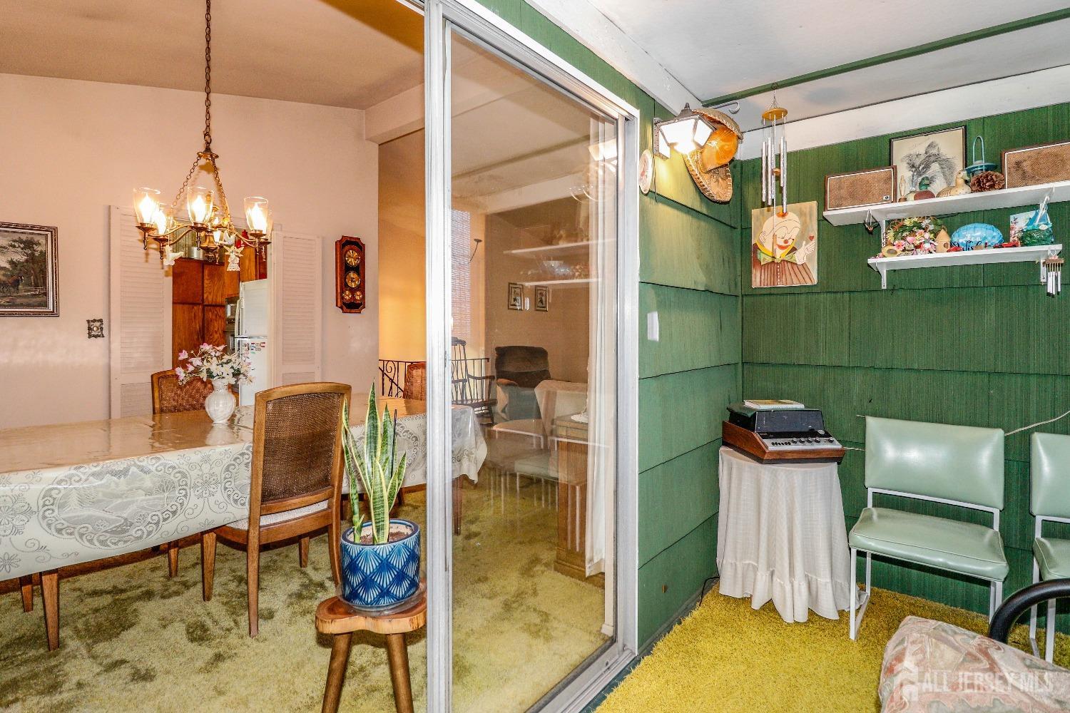 33 Harmon Road Edison, NJ 08837 - Photo 9 of 25 a view of a dining room with furniture and chandelier
