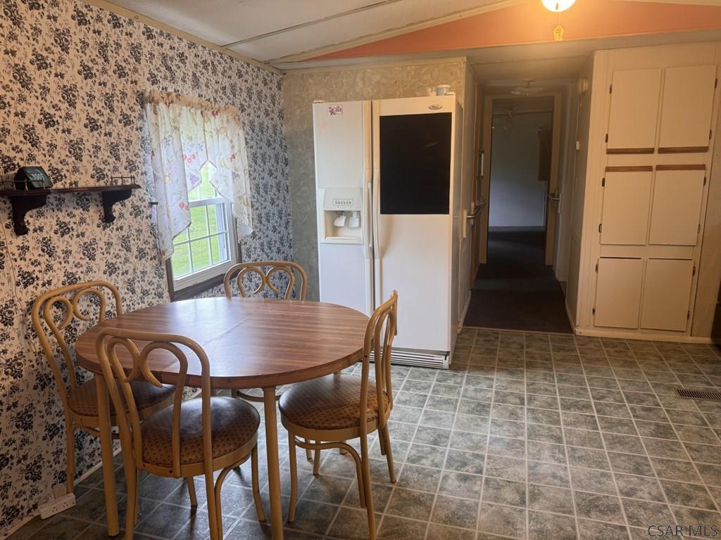127 1st Street Twin Rocks, PA 15960 - Photo 10 of 20 a view of a dining room with furniture and window
