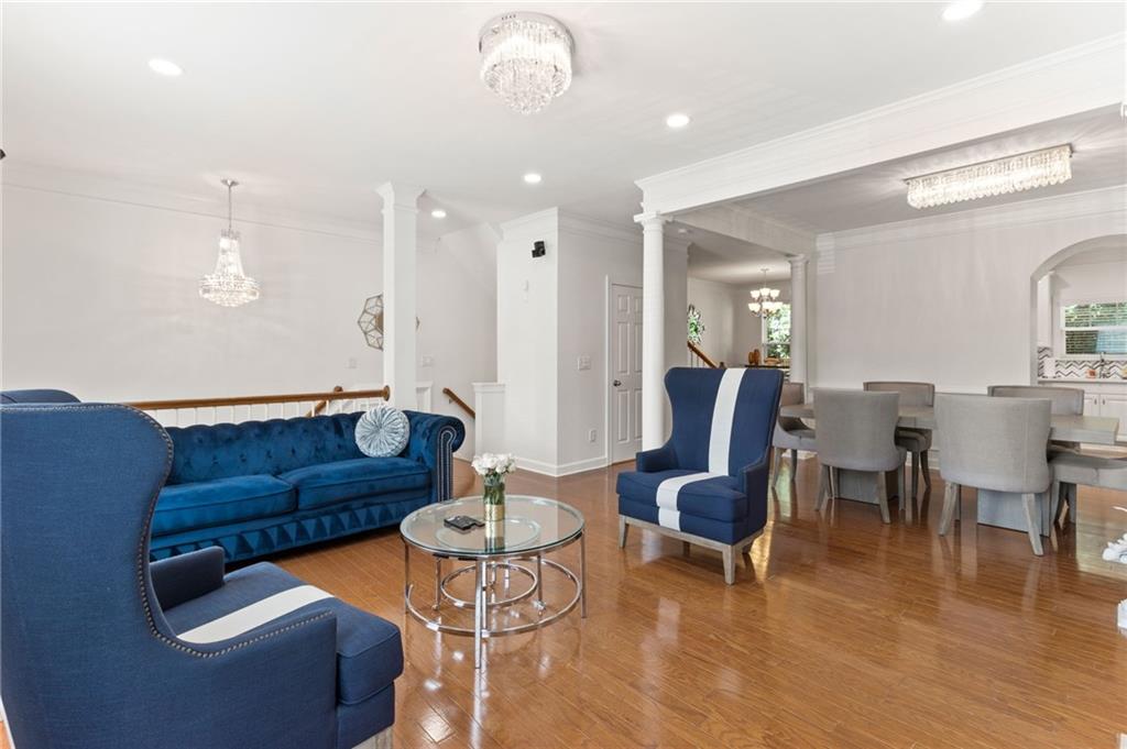 2086 Cobblestone Circle Northeast Atlanta, GA 30319 - Photo 12 of 34 a living room with furniture and wooden floor