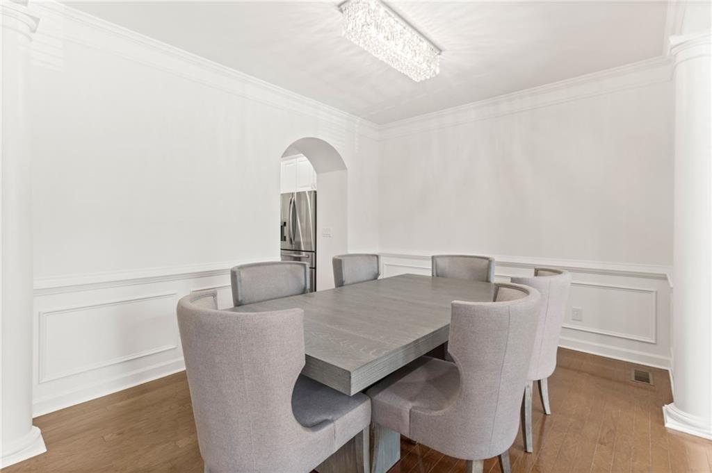 2086 Cobblestone Circle Northeast Atlanta, GA 30319 - Photo 13 of 34 a living room with furniture and a table
