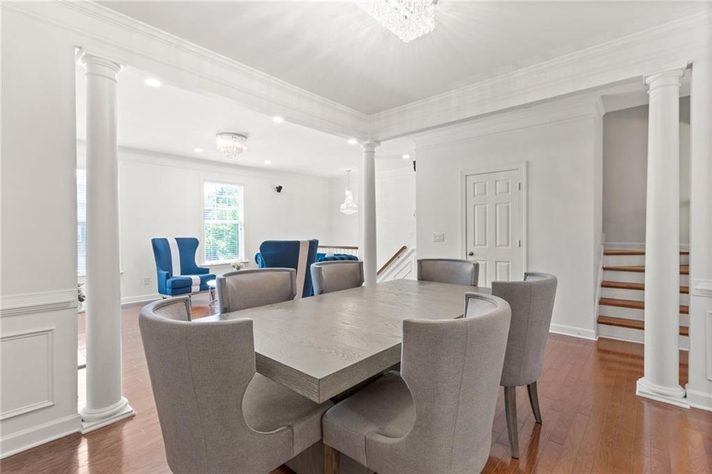 2086 Cobblestone Circle Northeast Atlanta, GA 30319 - Photo 14 of 34 a view of a dining room with furniture and wooden floor