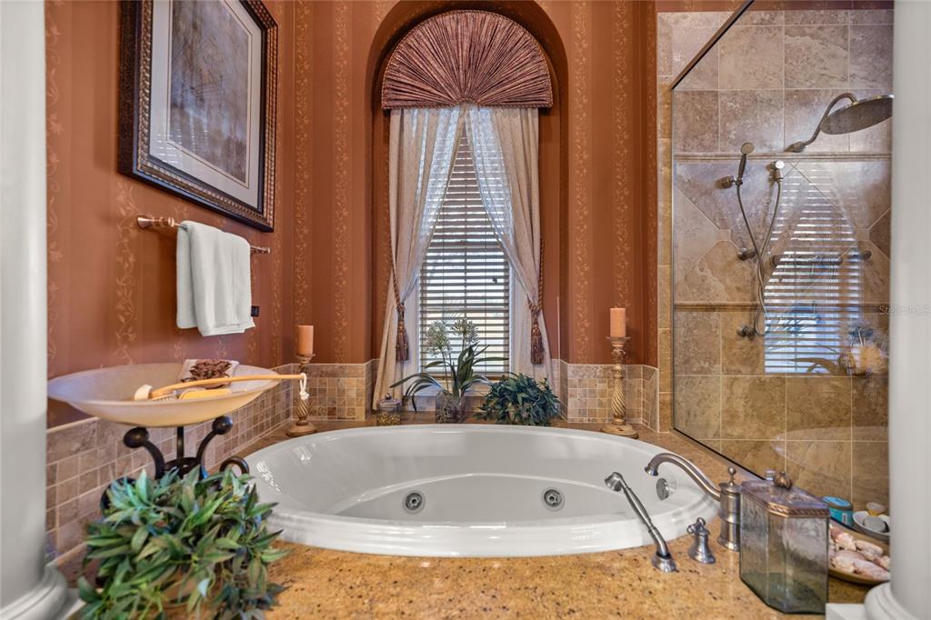 6861 Southwest 179th Ave Road Dunnellon, FL 34432 - Photo 18 of 59 a bathroom with a tub and a sink