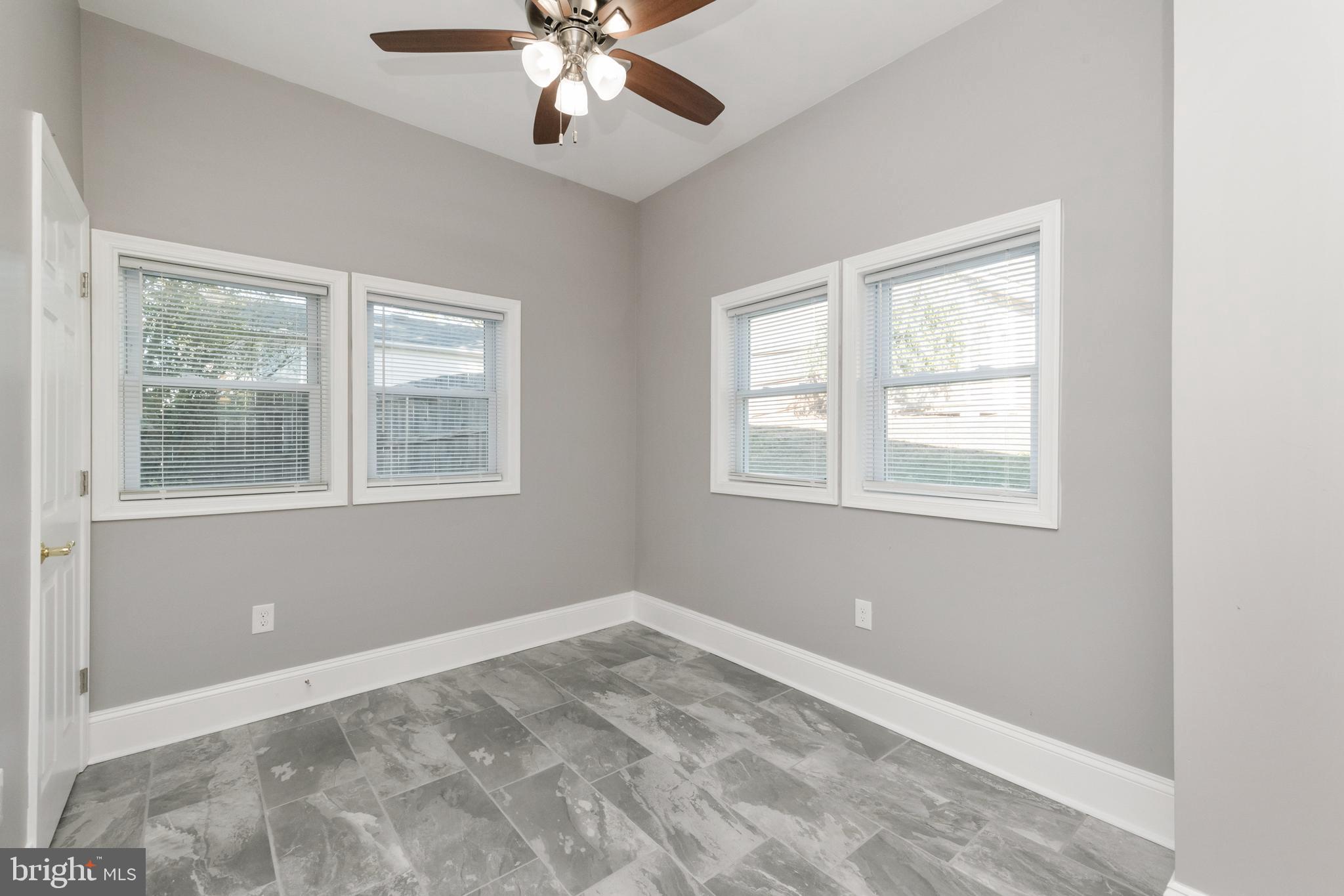 2505 Hammonds Ferry Road Baltimore, MD 21227 - Photo 17 of 36 a view of an empty room with a window
