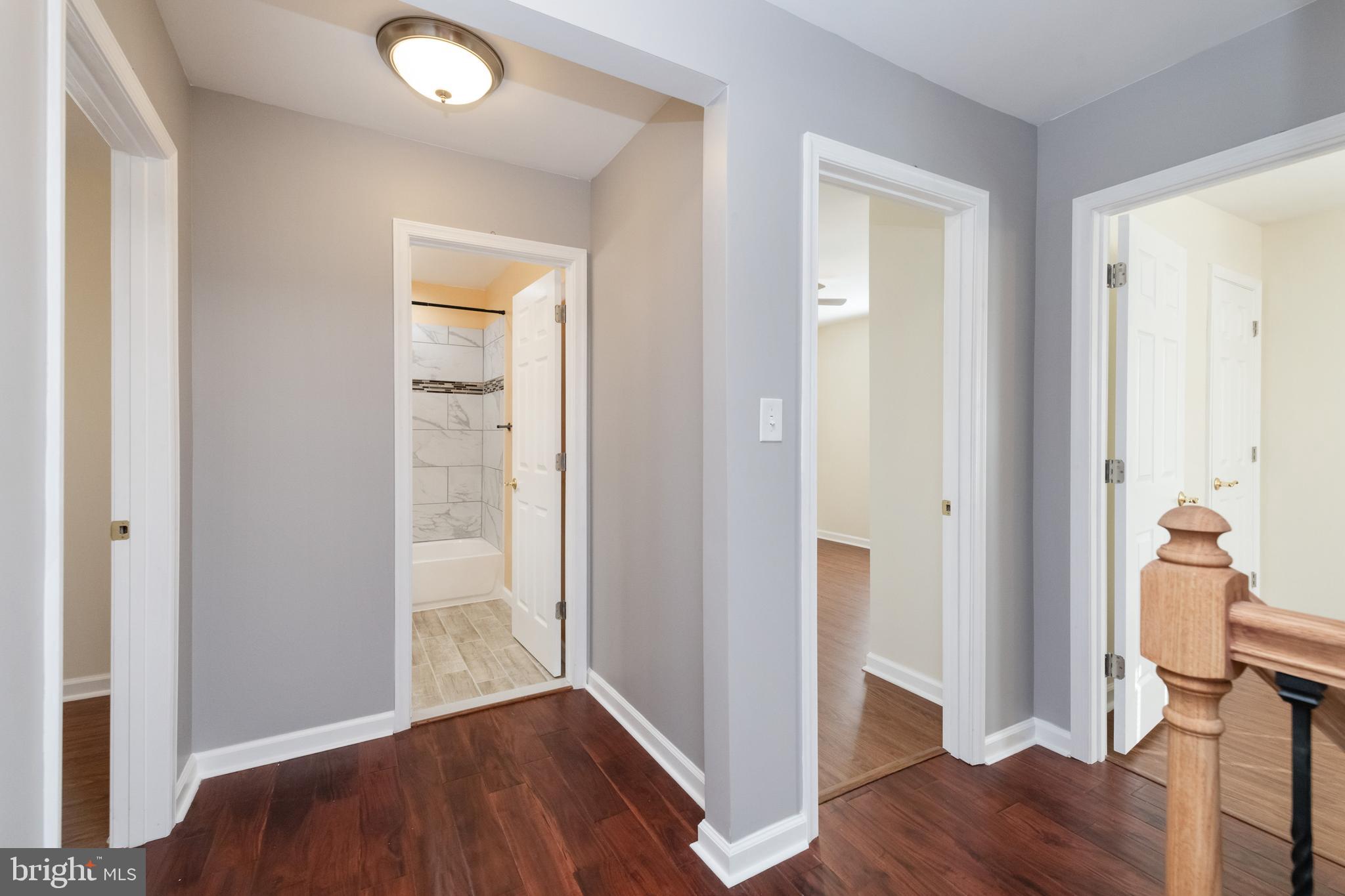 2505 Hammonds Ferry Road Baltimore, MD 21227 - Photo 21 of 36 a view of a hallway with wooden floor and closet