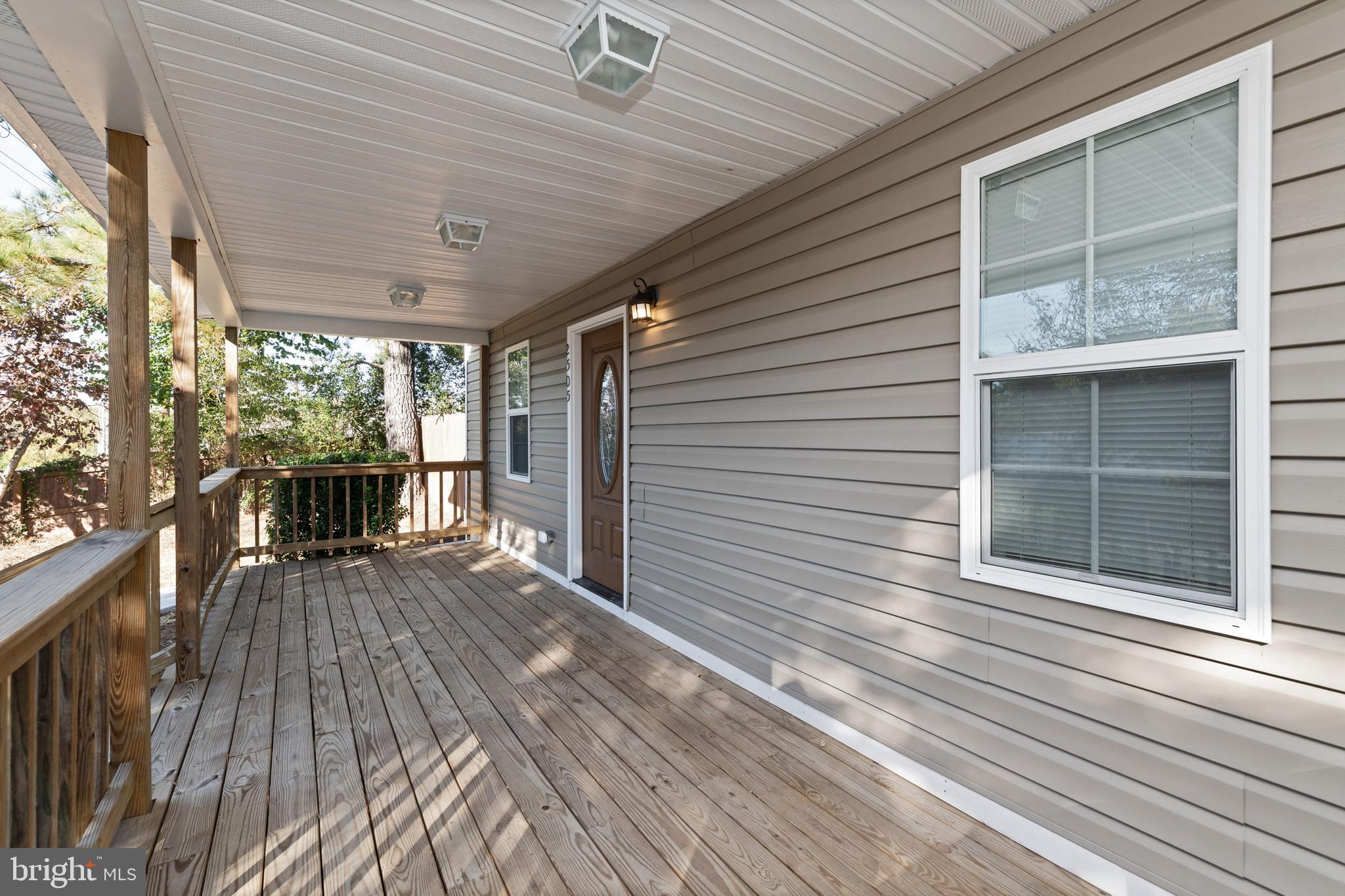 2505 Hammonds Ferry Road Baltimore, MD 21227 - Photo 4 of 36 a view of a house with wooden floor