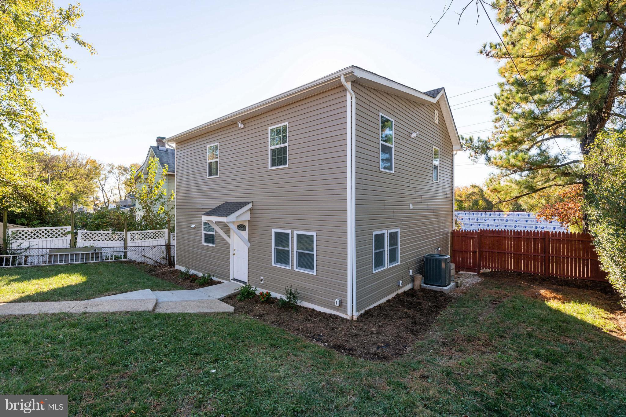 2505 Hammonds Ferry Road Baltimore, MD 21227 - Photo 36 of 36 a view of a house with a yard
