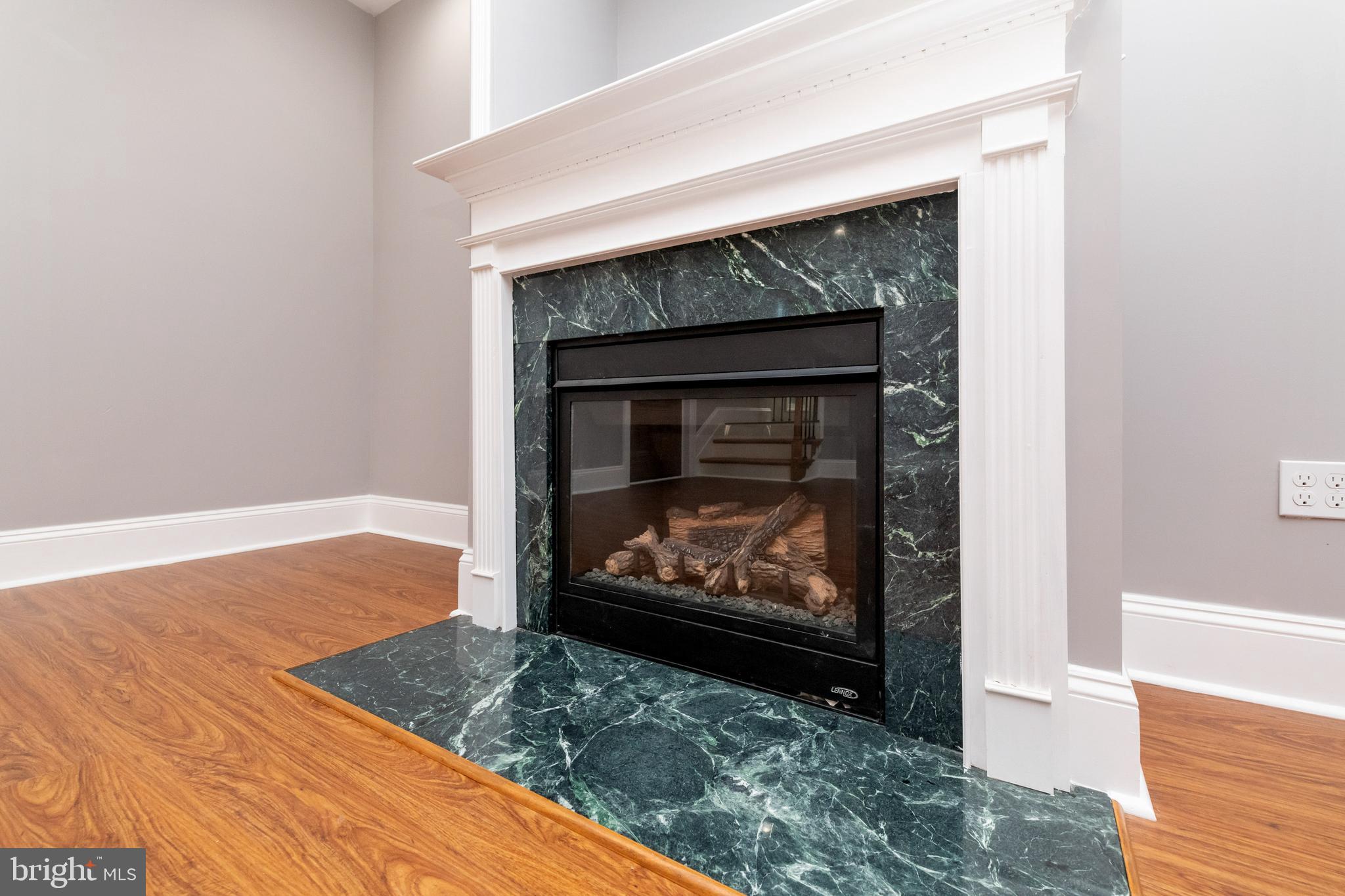 2505 Hammonds Ferry Road Baltimore, MD 21227 - Photo 8 of 36 a living room with a fireplace