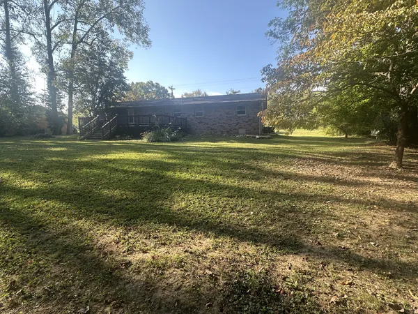 a fire hydrant in the middle of a field