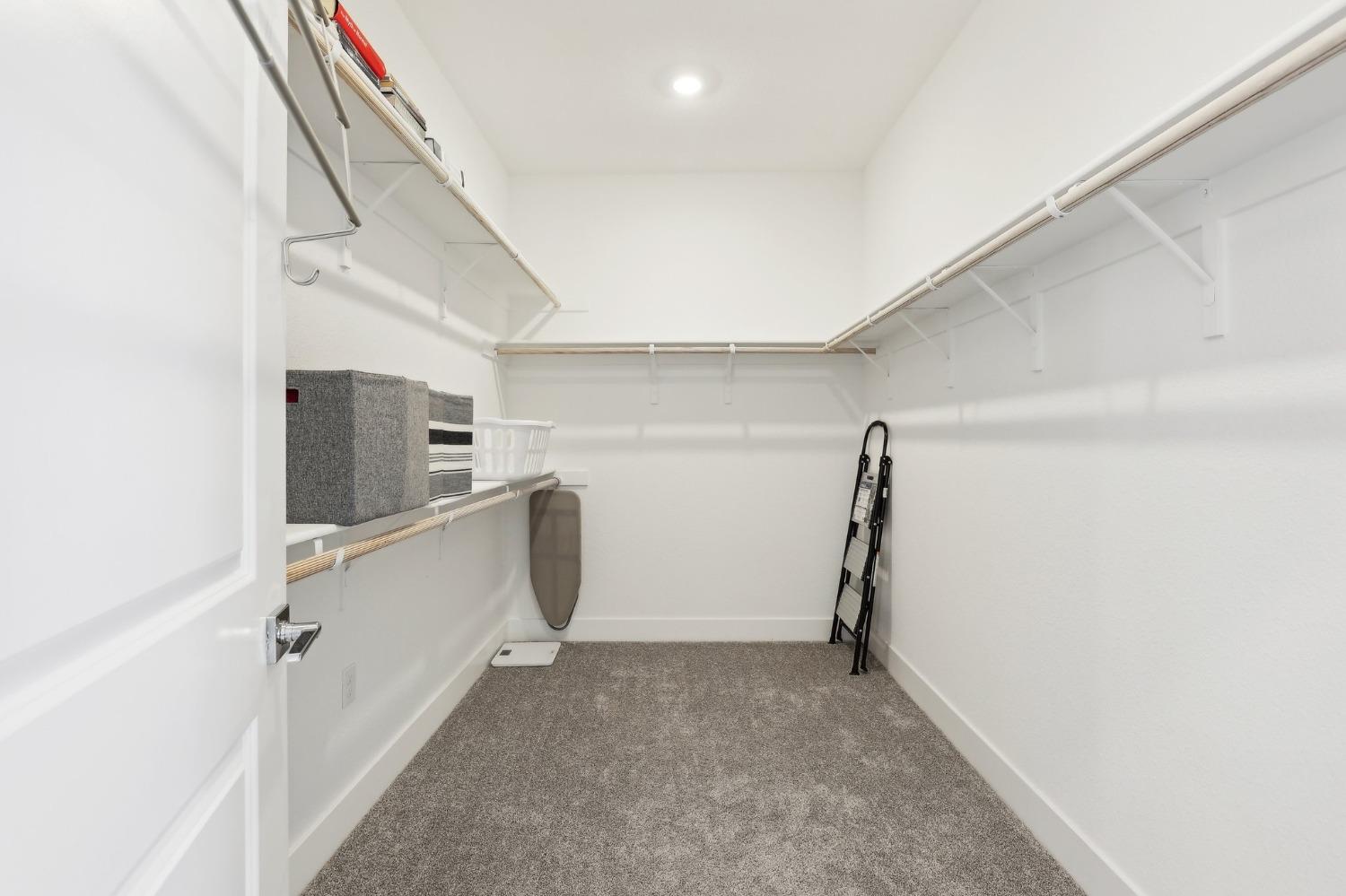 2200 Stagecoach Road Patterson, CA 95363 - Photo 30 of 35 a view of storage and utility room with stairs