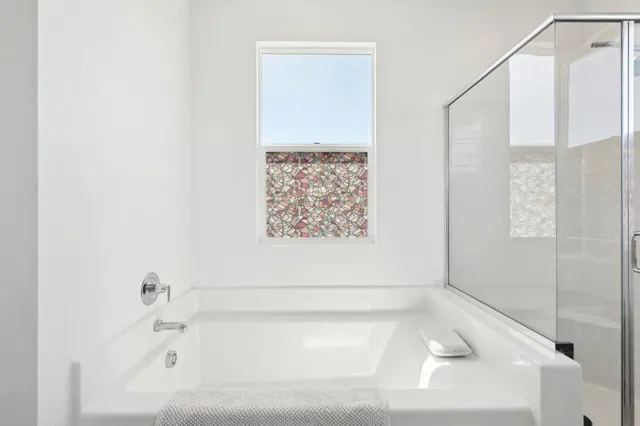 a workspace with furniture and a window