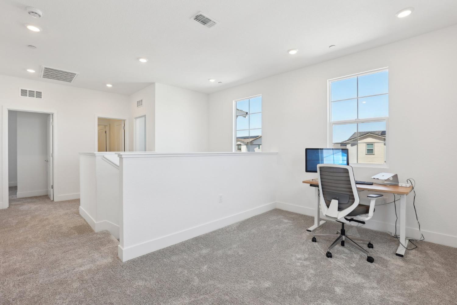 2200 Stagecoach Road Patterson, CA 95363 - Photo 33 of 35 a workspace with furniture and a window