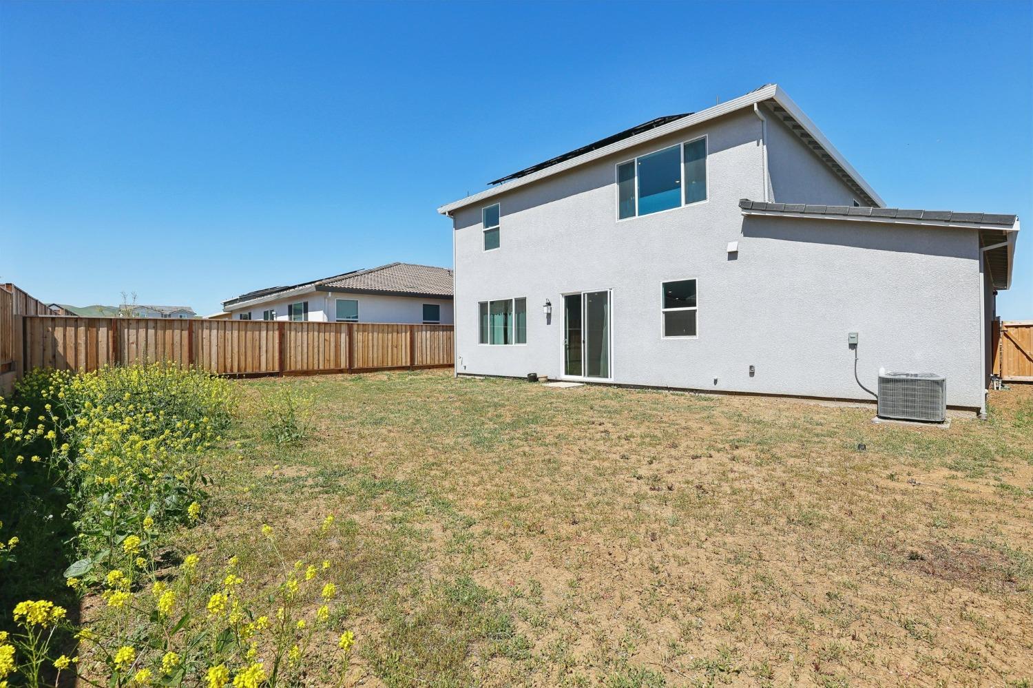 2200 Stagecoach Road Patterson, CA 95363 - Photo 35 of 35 a front view of a house with a yard
