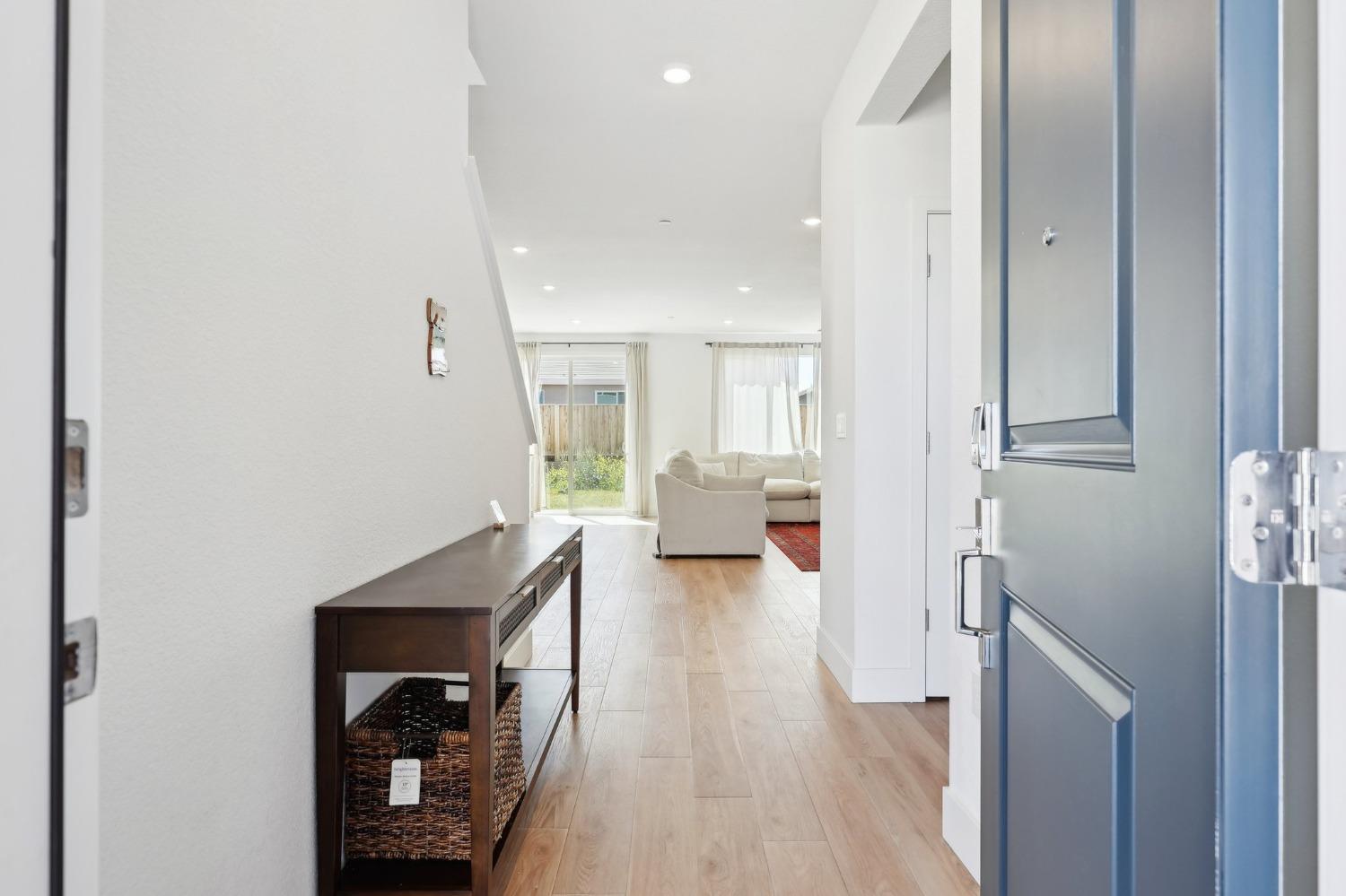 2200 Stagecoach Road Patterson, CA 95363 - Photo 5 of 35 a living room with furniture and a wooden floor