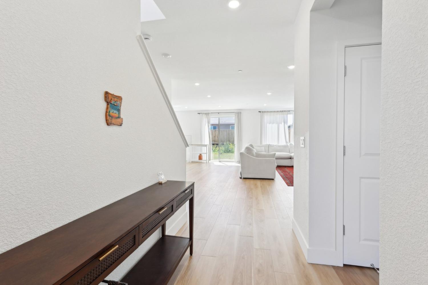 2200 Stagecoach Road Patterson, CA 95363 - Photo 6 of 35 a view of front door with furniture and wooden floor