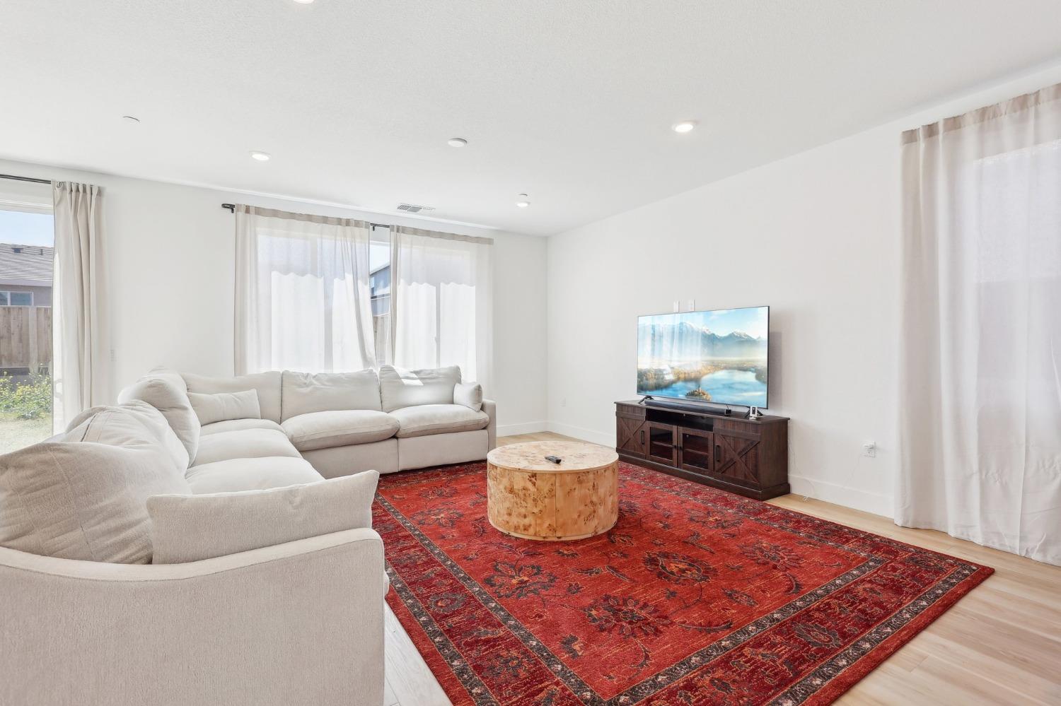 2200 Stagecoach Road Patterson, CA 95363 - Photo 7 of 35 a living room with furniture and a rug