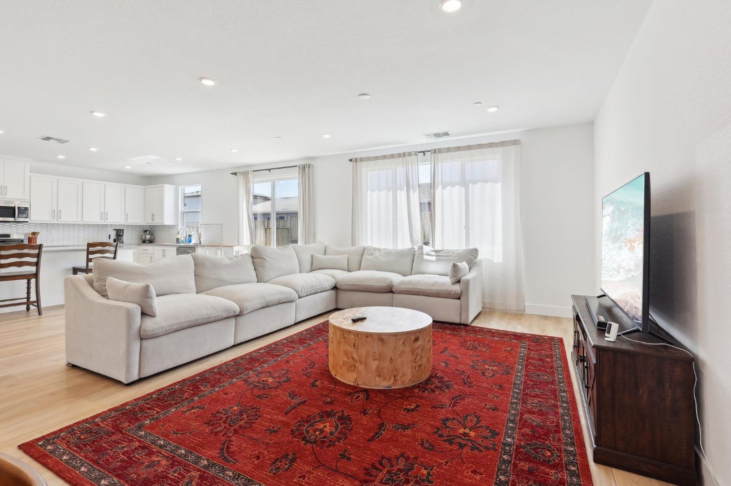 2200 Stagecoach Road Patterson, CA 95363 - Photo 8 of 35 a living room with furniture and a flat screen tv