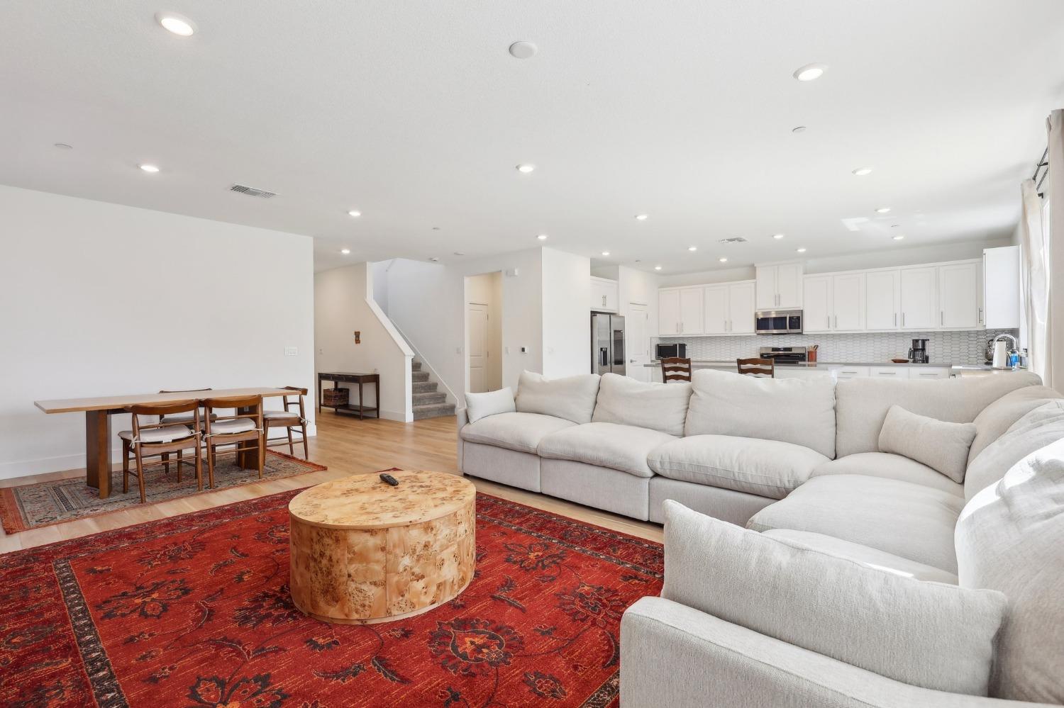 2200 Stagecoach Road Patterson, CA 95363 - Photo 9 of 35 a living room with furniture kitchen view and a dining table