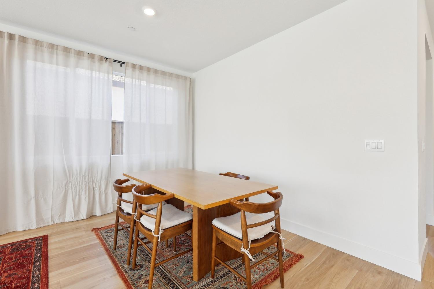 2200 Stagecoach Road Patterson, CA 95363 - Photo 10 of 35 a view of a room with furniture and wooden floor