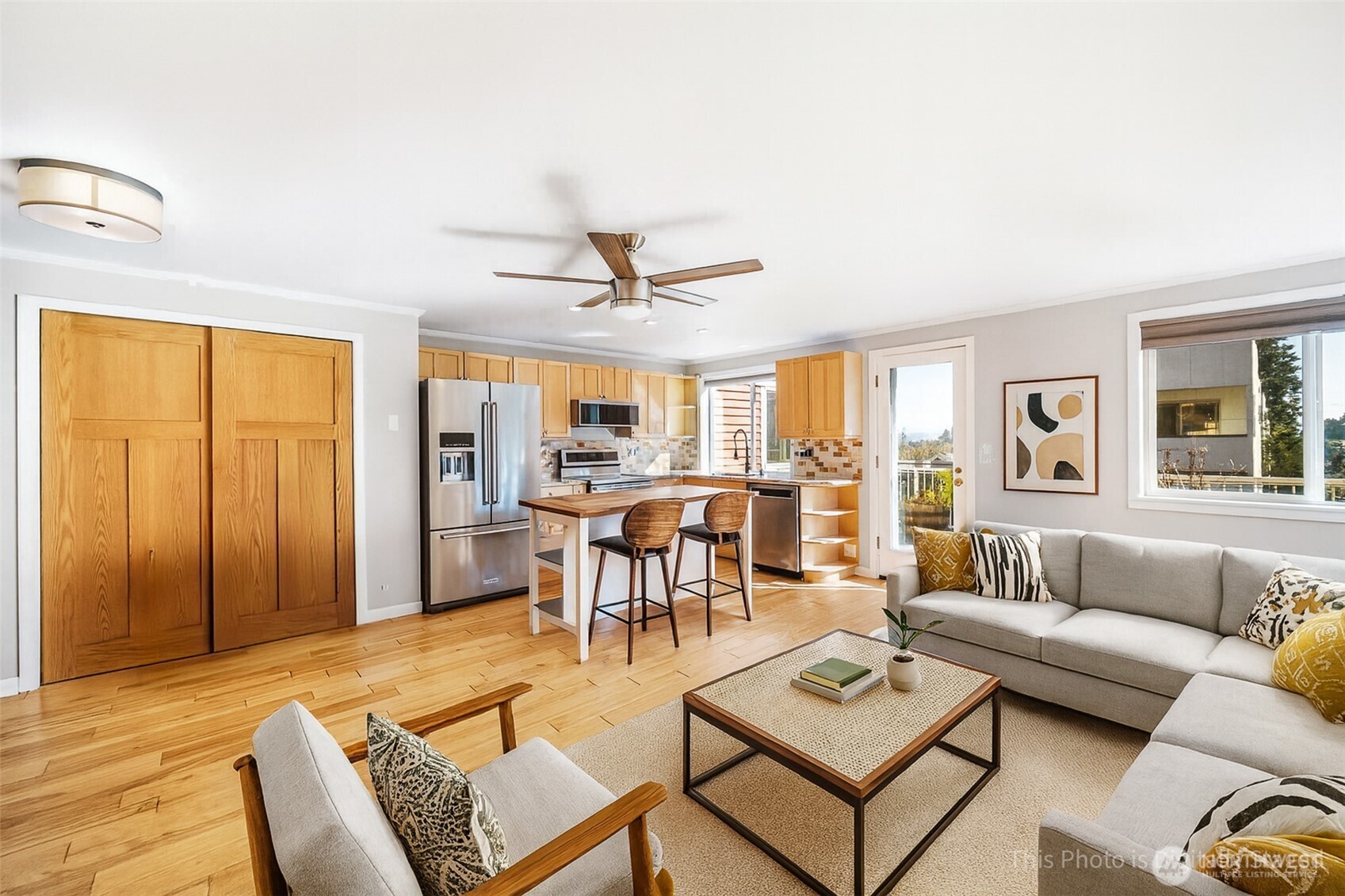 2400 East Howell Street, Unit G Seattle, WA 98122 - Photo 15 of 31 a living room with furniture and a window