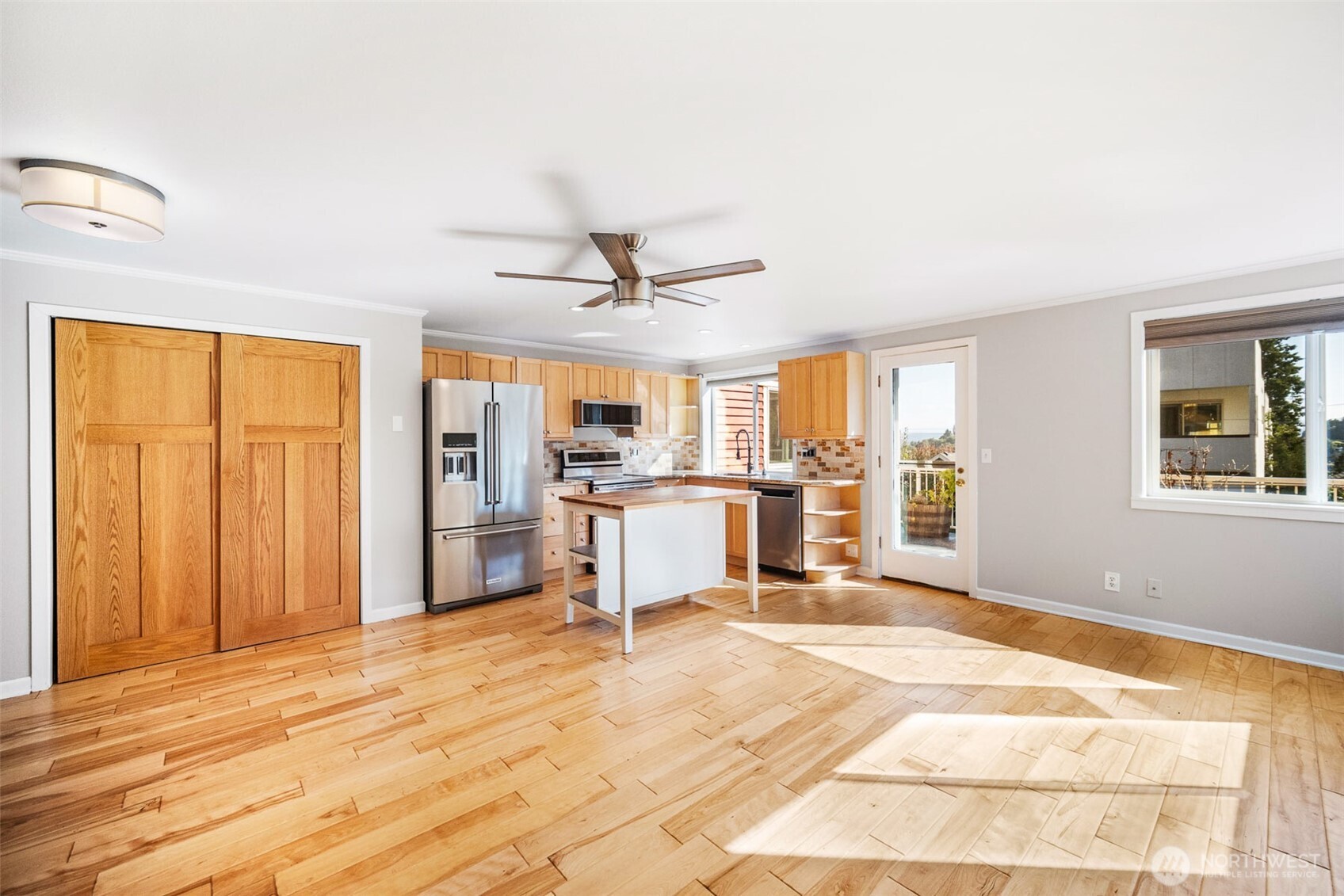 2400 East Howell Street, Unit G Seattle, WA 98122 - Photo 16 of 31 a view of a livingroom with a furniture wooden floor and window