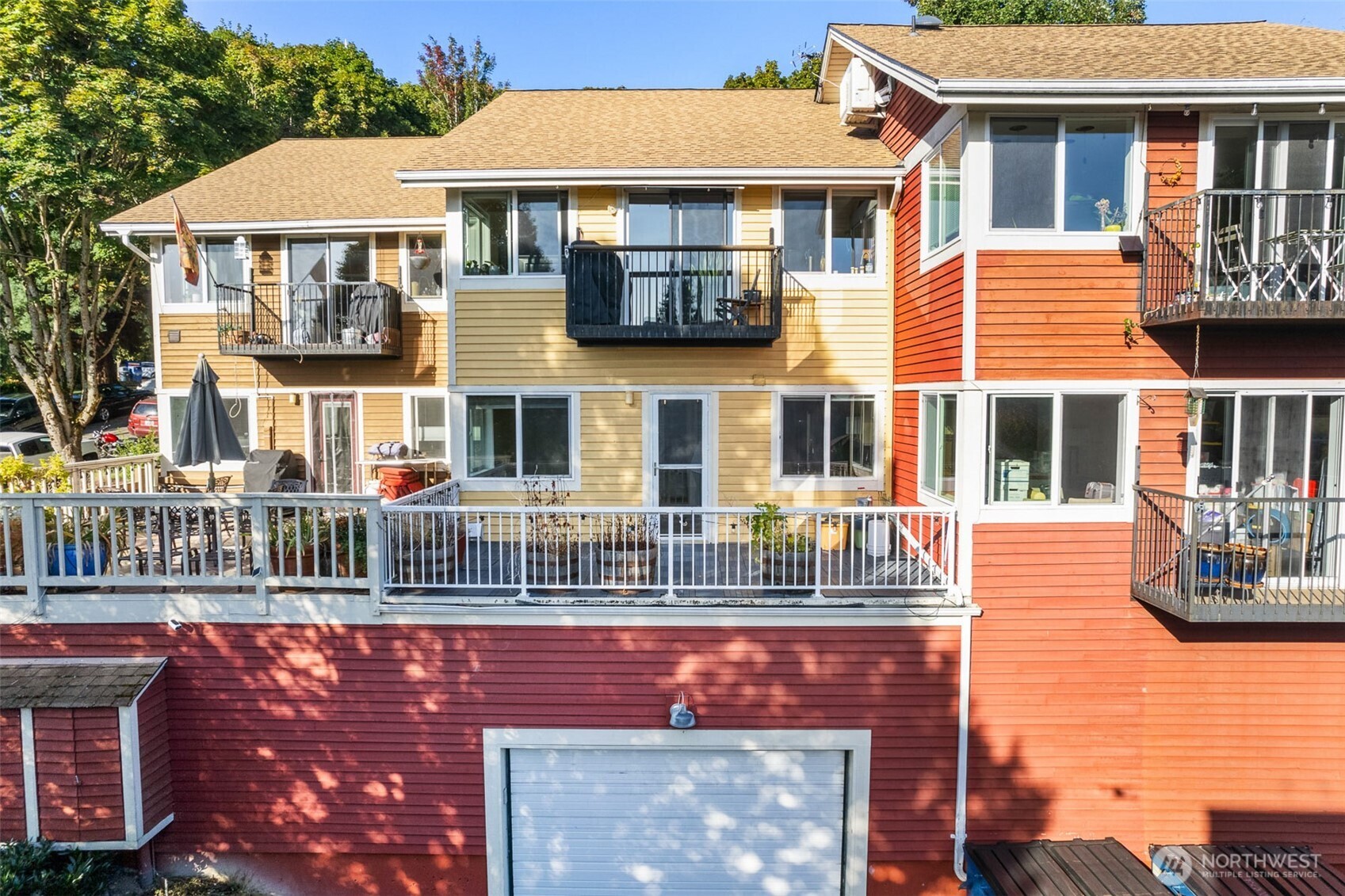 2400 East Howell Street, Unit G Seattle, WA 98122 - Photo 2 of 31 a front view of a house with large windows