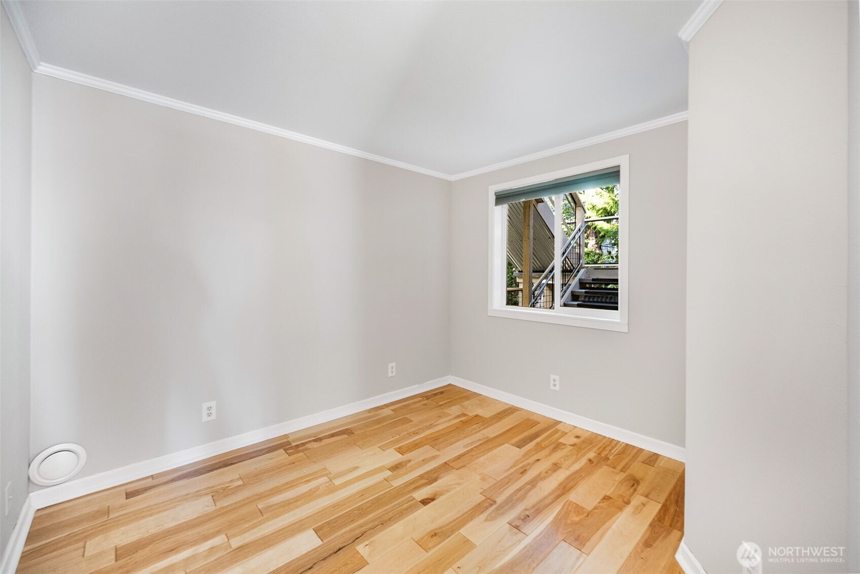 2400 East Howell Street, Unit G Seattle, WA 98122 - Photo 27 of 31 a view of a room with wooden floor and entryway