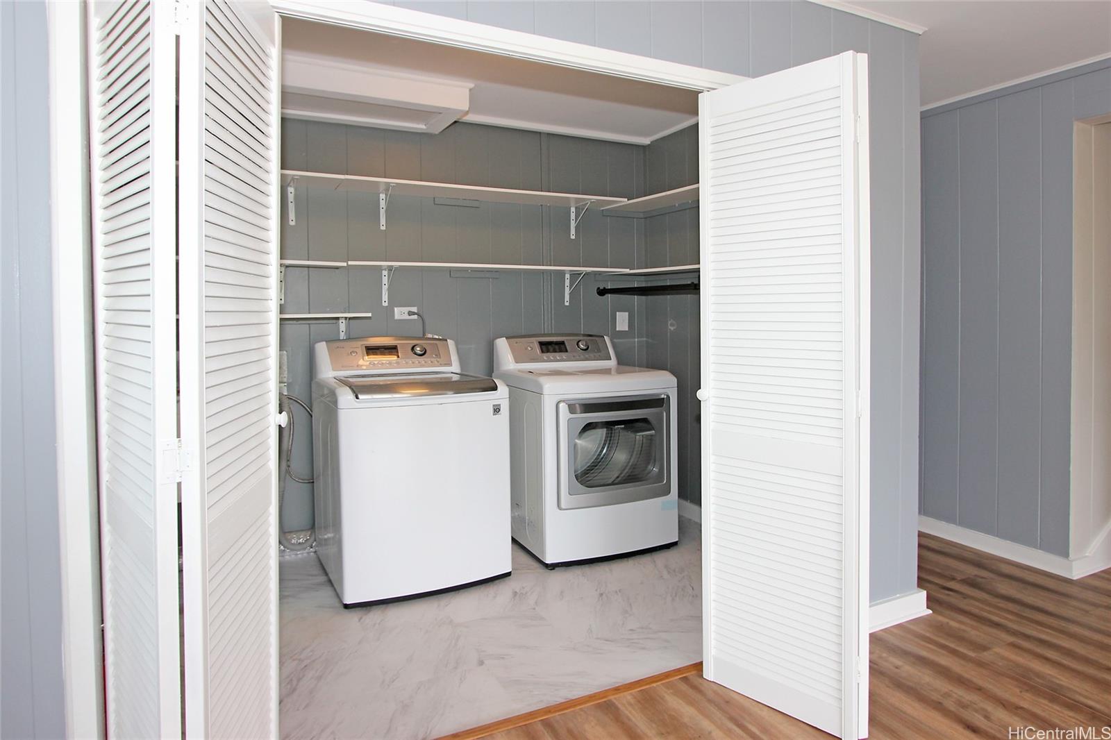 3647 Aliamanu Street Honolulu, HI 96818 - Photo 10 of 16 a utility room with dryer and washer