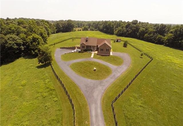 Welcome to 3443 Thompson Road, a beautiful brick home on 20 peaceful and private acres.  