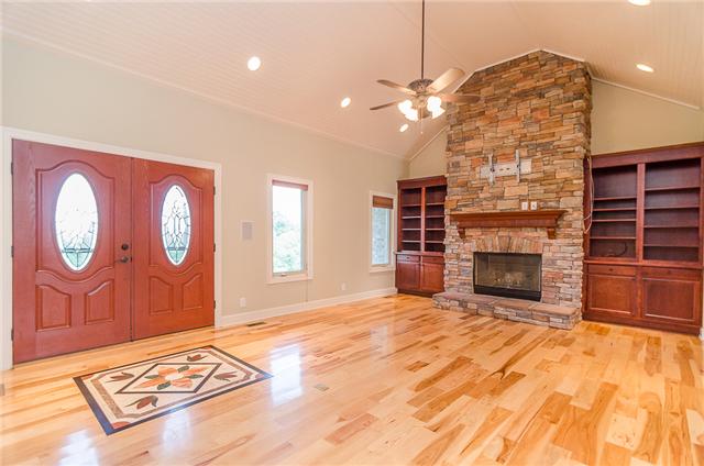 3443 Thompson Road Springfield, TN 37172 - Photo 3 of 20 Elegant double-door entrance with decorative marble in-lay in the foyer. You'll also love the vaulted ceilings finished with bead-board.