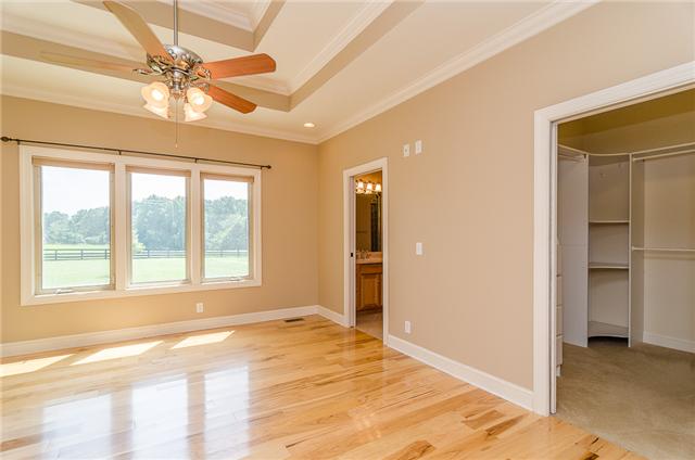 3443 Thompson Road Springfield, TN 37172 - Photo 8 of 20 This home has a huge master suite! It features a double tray ceiling, hardwood flooring and direct access to one of the large walk-in closets with a built-in organizational system.