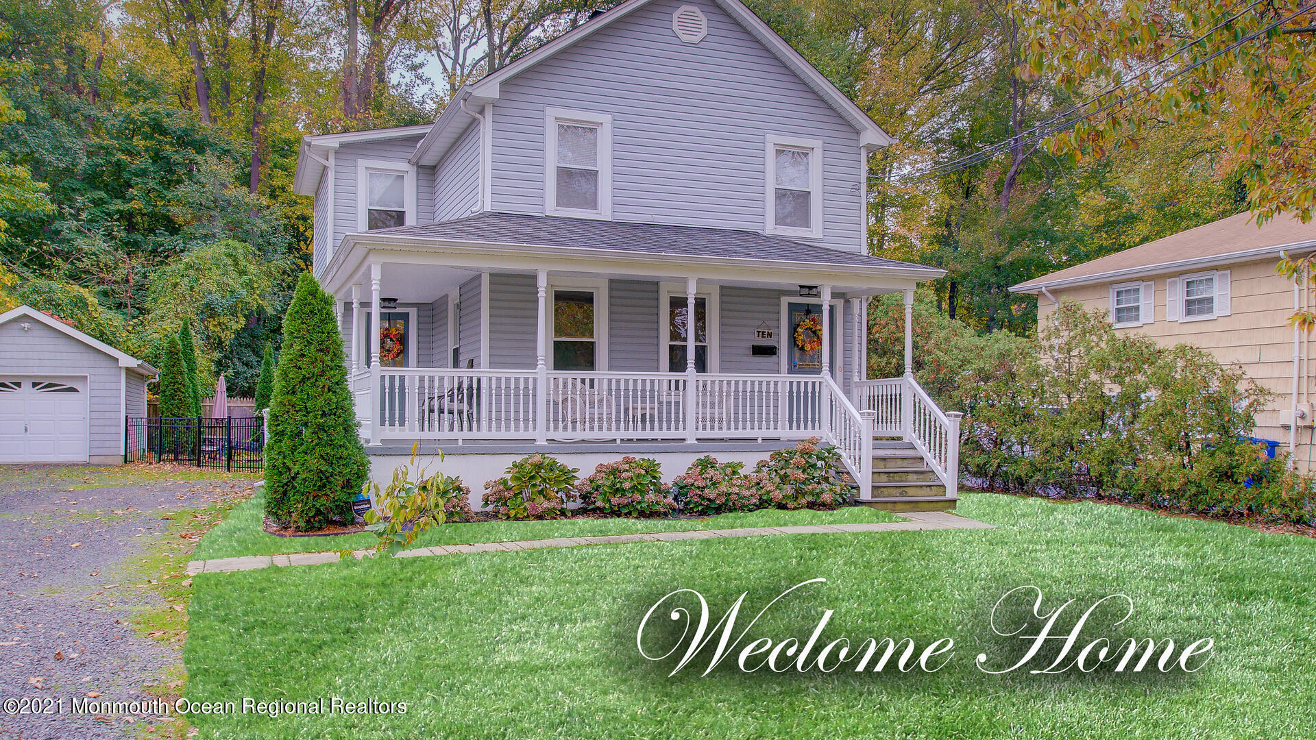 10 Cherry Tree Farm Road Middletown, NJ 07748 - Photo 1 of 43 a front view of a house with a yard