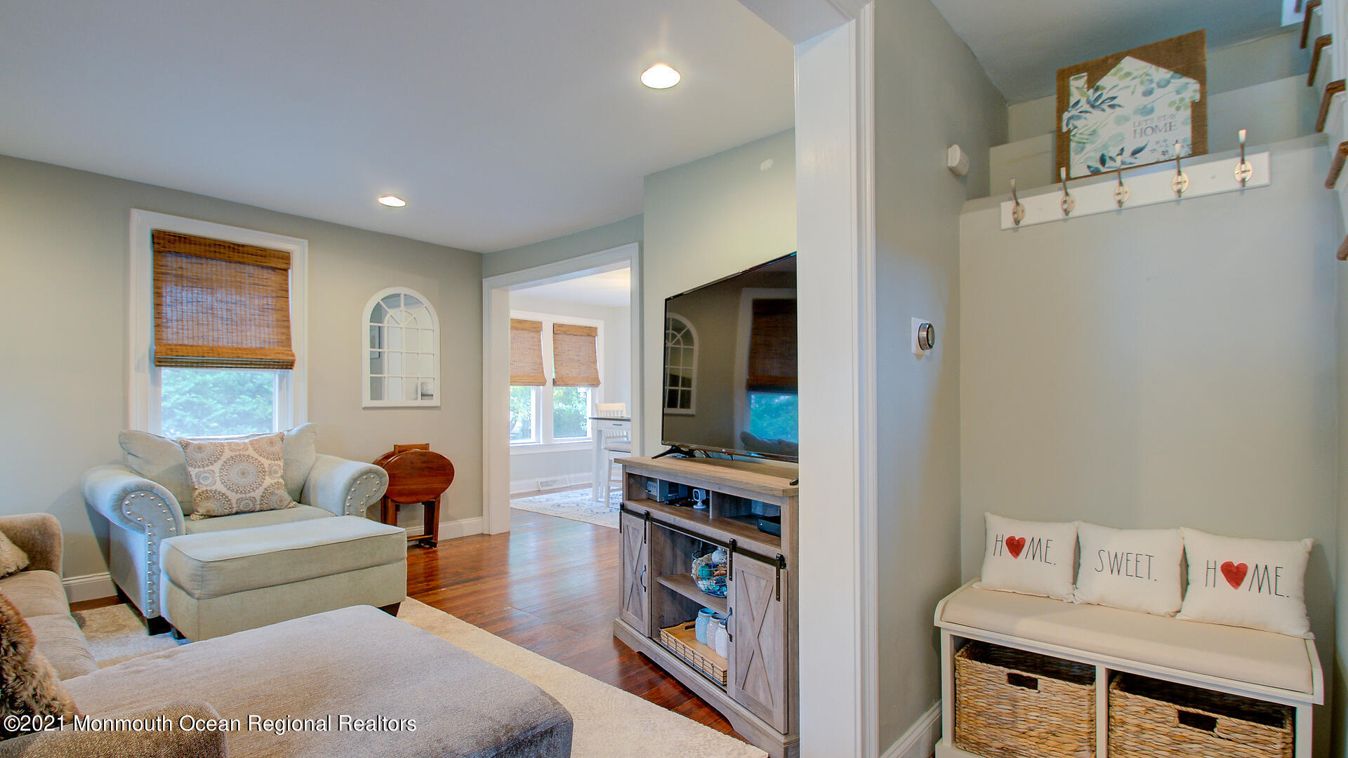 10 Cherry Tree Farm Road Middletown, NJ 07748 - Photo 11 of 43 a living room with furniture and a flat screen tv