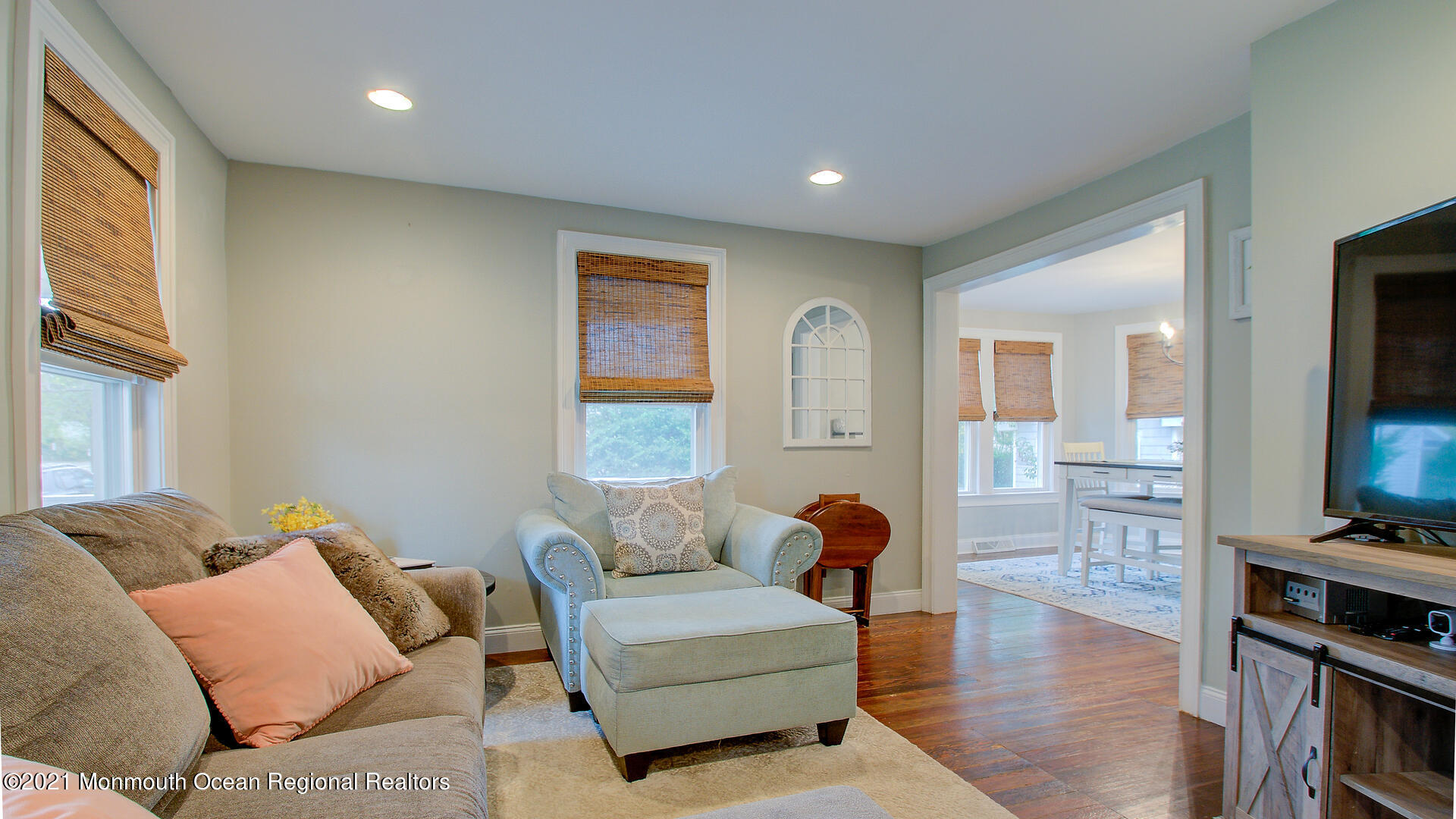 10 Cherry Tree Farm Road Middletown, NJ 07748 - Photo 14 of 43 a living room with furniture and a flat screen tv